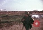 Image of 173rd Airborne Brigade troops Vietnam Bien Hoa Air Base, 1965, second 50 stock footage video 65675022739