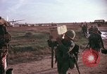 Image of 173rd Airborne Brigade troops Vietnam Bien Hoa Air Base, 1965, second 51 stock footage video 65675022739