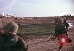 Image of 173rd Airborne Brigade troops Vietnam Bien Hoa Air Base, 1965, second 52 stock footage video 65675022739