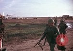 Image of 173rd Airborne Brigade troops Vietnam Bien Hoa Air Base, 1965, second 53 stock footage video 65675022739