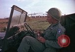 Image of 173rd Airborne Brigade troops Vietnam Bien Hoa Air Base, 1965, second 60 stock footage video 65675022739