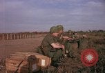 Image of American Army 173rd Airborne Brigade troops in Vietnam Vietnam Bien Hoa Air Base, 1965, second 13 stock footage video 65675022740