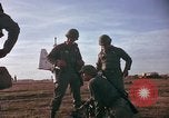 Image of American Army 173rd Airborne Brigade troops in Vietnam Vietnam Bien Hoa Air Base, 1965, second 58 stock footage video 65675022740