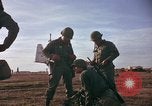 Image of American Army 173rd Airborne Brigade troops in Vietnam Vietnam Bien Hoa Air Base, 1965, second 59 stock footage video 65675022740