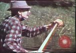 Image of Birch tree Canoe United States USA, 1975, second 15 stock footage video 65675022754