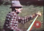 Image of Birch tree Canoe United States USA, 1975, second 17 stock footage video 65675022754