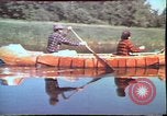 Image of Birch tree Canoe United States USA, 1975, second 18 stock footage video 65675022754