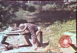 Image of Birch tree Canoe United States USA, 1975, second 42 stock footage video 65675022754