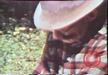Image of Birch tree Canoe United States USA, 1975, second 47 stock footage video 65675022754