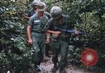Image of 25th Infantry Division soldiers Vietnam Cu Chi, 1967, second 54 stock footage video 65675022783