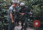 Image of 25th Infantry Division soldiers Vietnam Cu Chi, 1967, second 56 stock footage video 65675022783