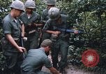 Image of 25th Infantry Division soldiers Vietnam Cu Chi, 1967, second 62 stock footage video 65675022783