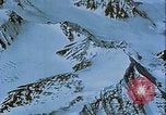 Image of Snow covered mountain peaks Arctic Region, 1954, second 36 stock footage video 65675022827