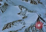 Image of Snow covered mountain peaks Arctic Region, 1954, second 37 stock footage video 65675022827