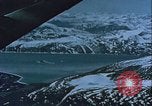 Image of Snow covered mountain peaks Arctic Region, 1954, second 39 stock footage video 65675022827