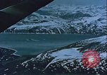 Image of Snow covered mountain peaks Arctic Region, 1954, second 41 stock footage video 65675022827