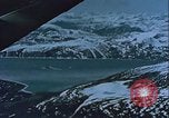 Image of Snow covered mountain peaks Arctic Region, 1954, second 43 stock footage video 65675022827