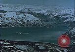 Image of Snow covered mountain peaks Arctic Region, 1954, second 52 stock footage video 65675022827