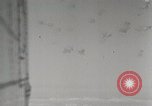 Standbild US B-24 Liberator Bomber angreifen Iwo Jima Iwo Jima, 1945, aus Sekunde 21 historischem Filmmaterial Videoclip 65675022850