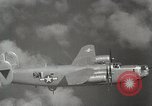 Standbild US B-24 Liberator Bomber angreifen Iwo Jima Iwo Jima, 1945, aus Sekunde 27 historischem Filmmaterial Videoclip 65675022850