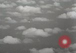 Standbild US B-24 Liberator Bomber angreifen Iwo Jima Iwo Jima, 1945, aus Sekunde 41 historischem Filmmaterial Videoclip 65675022850