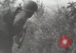 Standbild US Army 81st Infantry Division Palau Inseln, 1945, aus Sekunde 28 historischem Filmmaterial Videoclip 65675022854