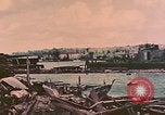Standbild Waterfront Zerstörung Palau Inseln, 1944, aus Sekunde 54 historischem Filmmaterial Videoclip 65675022883