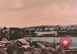 Standbild Waterfront Zerstörung Palau Inseln, 1944, aus Sekunde 57 historischem Filmmaterial Videoclip 65675022883