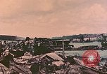 Standbild Waterfront Zerstörung Palau Inseln, 1944, aus Sekunde 60 historischem Filmmaterial Videoclip 65675022883