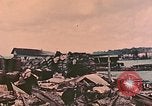 Standbild Waterfront Zerstörung Palau Inseln, 1944, aus Sekunde 62 historischem Filmmaterial Videoclip 65675022883