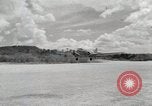 Standbild C-47 Skytrain New Guinea, 1944, aus Sekunde 40 historischem Filmmaterial Videoclip 65675022924