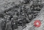 Image of Medics tend to wounded U.S. soldiers on beach Normandy France, 1944, second 29 stock footage video 65675022977