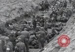 Image of Medics tend to wounded U.S. soldiers on beach Normandy France, 1944, second 39 stock footage video 65675022977