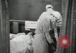Immagine di Ostetrica Chicago Illinois USA, 1940, secondo 52 filmato di repertorio 65675023076