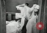 Immagine di Ostetrica Chicago Illinois USA, 1940, secondo 58 filmato di repertorio 65675023076