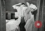 Immagine di Ostetrica Chicago Illinois USA, 1940, secondo 59 filmato di repertorio 65675023076