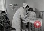 Immagine di Bambino soffre di tubercolosi Detroit Michigan USA, 1936, secondo 18 filmato di repertorio 65675023152