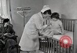 Immagine di Bambino soffre di tubercolosi Detroit Michigan USA, 1936, secondo 19 filmato di repertorio 65675023152