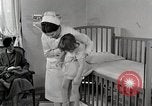 Immagine di Bambino soffre di tubercolosi Detroit Michigan USA, 1936, secondo 22 filmato di repertorio 65675023152