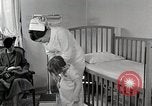 Immagine di Bambino soffre di tubercolosi Detroit Michigan USA, 1936, secondo 24 filmato di repertorio 65675023152