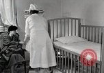 Immagine di Bambino soffre di tubercolosi Detroit Michigan USA, 1936, secondo 28 filmato di repertorio 65675023152