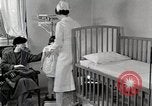 Immagine di Bambino soffre di tubercolosi Detroit Michigan USA, 1936, secondo 29 filmato di repertorio 65675023152