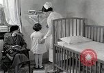 Immagine di Bambino soffre di tubercolosi Detroit Michigan USA, 1936, secondo 37 filmato di repertorio 65675023152