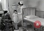 Immagine di Bambino soffre di tubercolosi Detroit Michigan USA, 1936, secondo 47 filmato di repertorio 65675023152
