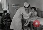 Immagine di Bambino soffre di tubercolosi Detroit Michigan USA, 1936, secondo 58 filmato di repertorio 65675023152
