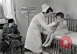 Immagine di Bambino soffre di tubercolosi Detroit Michigan USA, 1936, secondo 61 filmato di repertorio 65675023152