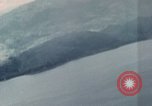 Standbild Gun camera footage strafing Ziele Tarumizu Kyushu in Japan, 1945, aus Sekunde 3 historischem Filmmaterial Videoclip 65675023197