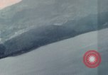 Standbild Gun camera footage strafing Ziele Tarumizu Kyushu in Japan, 1945, aus Sekunde 4 historischem Filmmaterial Videoclip 65675023197
