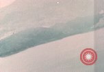 Standbild Gun camera footage strafing Ziele Tarumizu Kyushu in Japan, 1945, aus Sekunde 5 historischem Filmmaterial Videoclip 65675023197