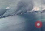 Standbild Gun camera footage strafing Ziele Tarumizu Kyushu in Japan, 1945, aus Sekunde 10 historischem Filmmaterial Videoclip 65675023197